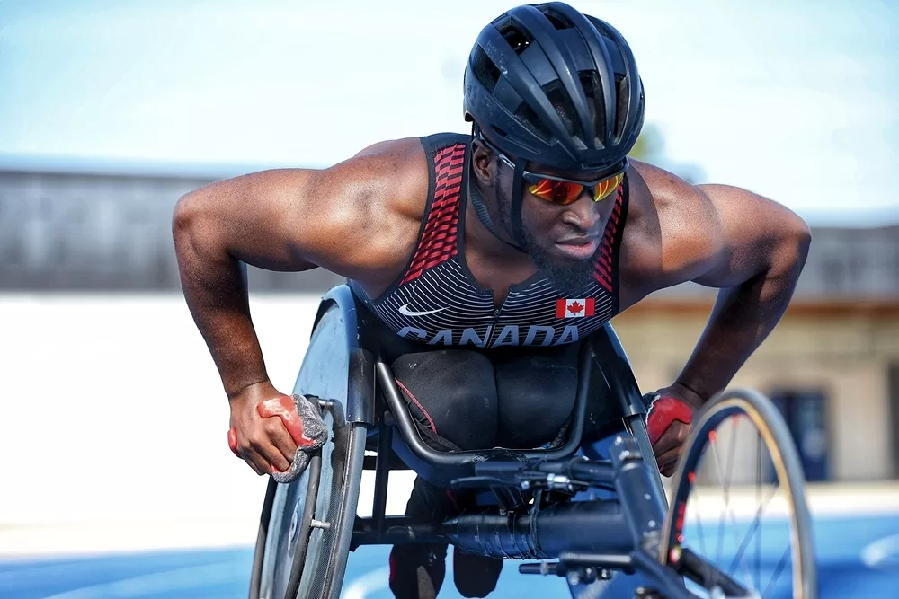 Isaiah Christophe - Paralympic Athlete on track in his chair